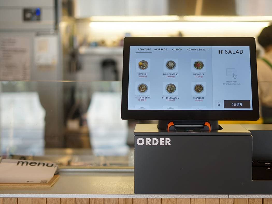 Electronic menu board using a tablet PC where customers can place orders directly