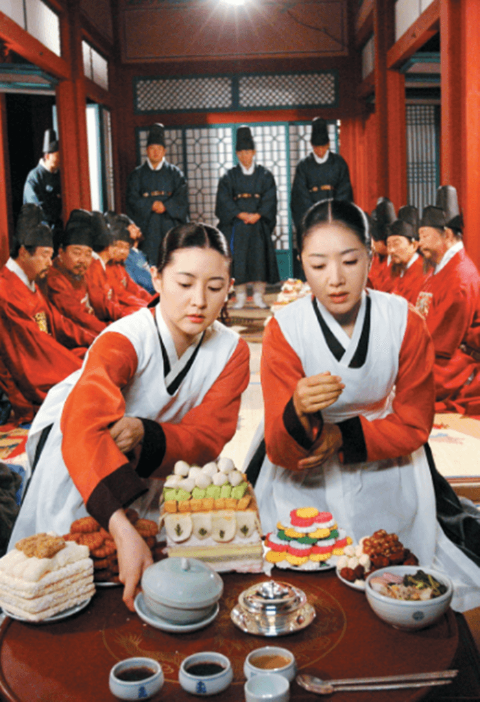 Actors in hanbok from a scene from the drama Dae Jang Geum.