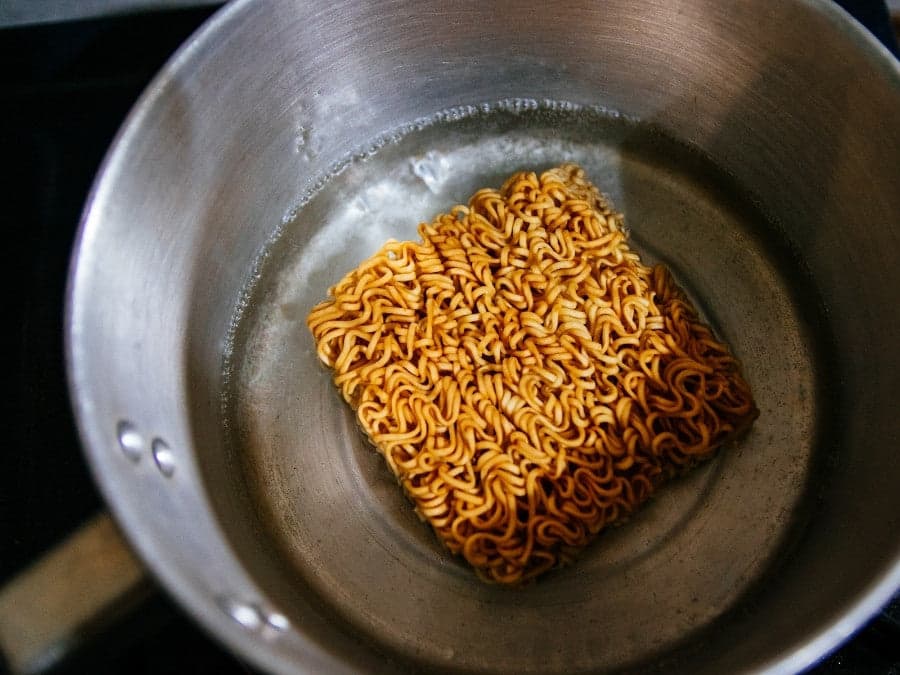 Ramen in a pot being cooked