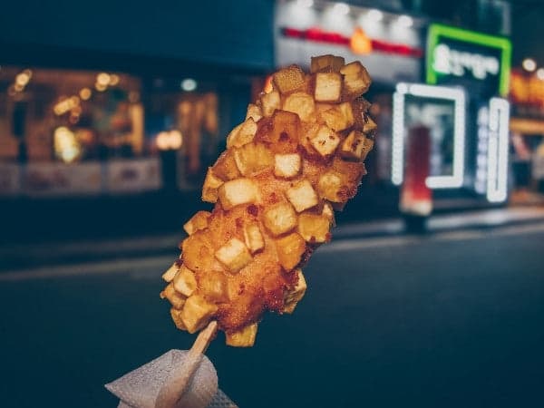 Korean corn dog in hand